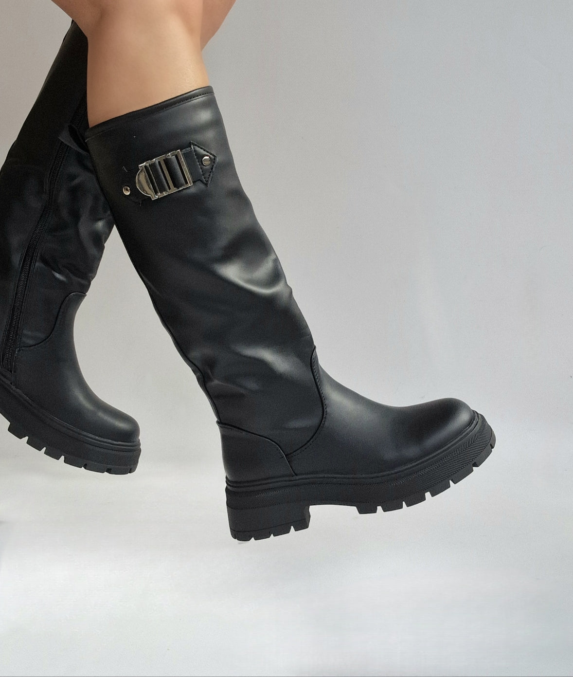 Black cleated sole boots