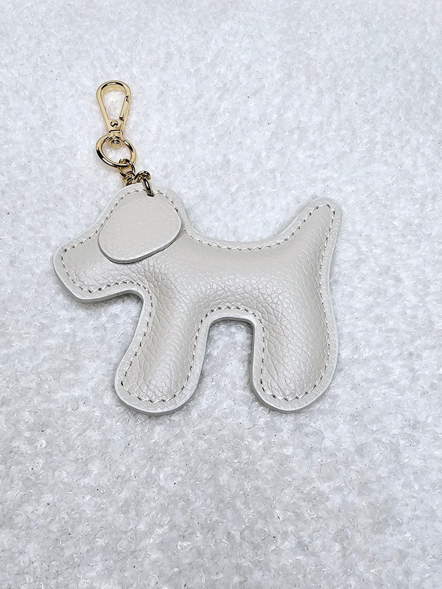 Grigri de sac en cuir Chien Beige