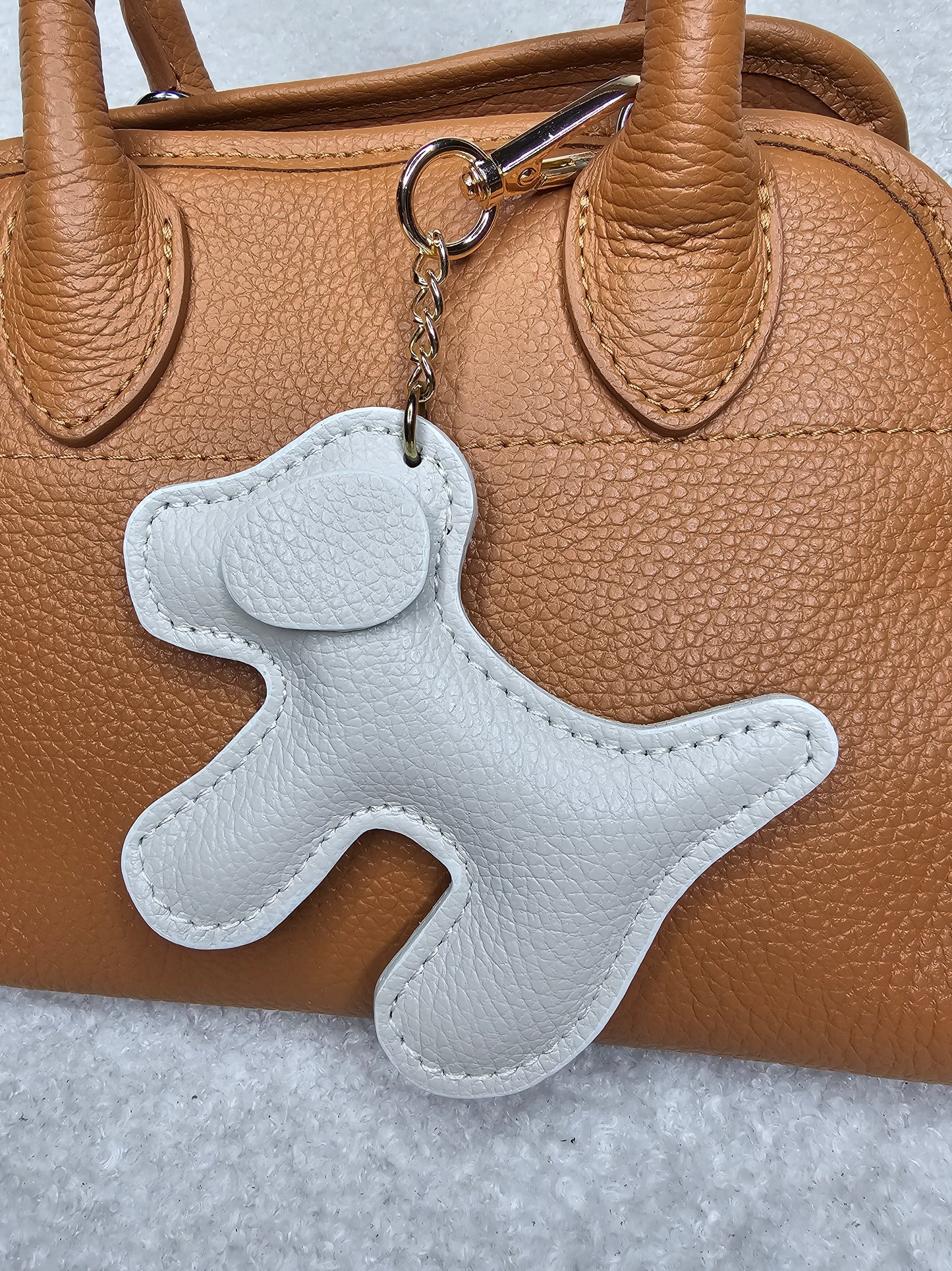 Grigri de sac en cuir Chien Beige