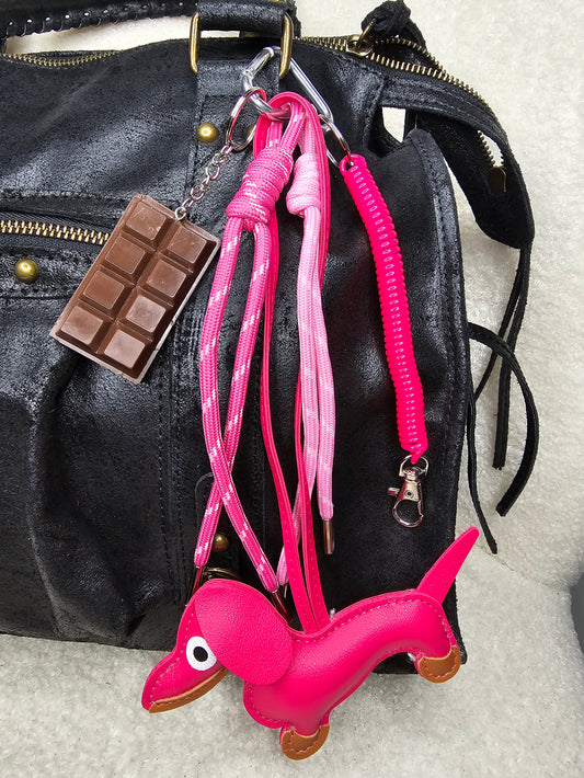 Grigri de sac en Chien Fushia